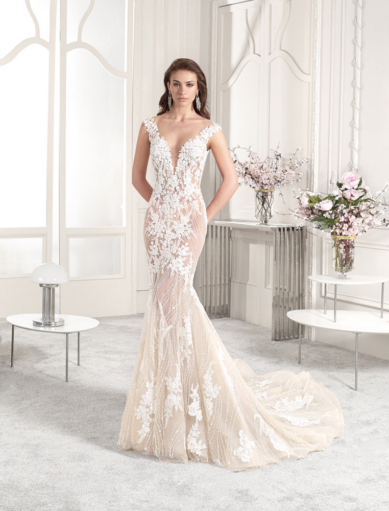 Mermaid wedding gown with floral lace and cap sleeves